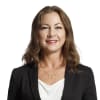 En profilbild av fastighetsmäklare Petra Nilbo