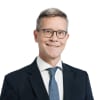 En profilbild av fastighetsmäklare Martin Granberg