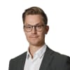 En profilbild av fastighetsmäklare Andreas Stiglund