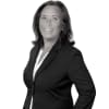 En profilbild av fastighetsmäklare Lena Kofoed