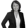 En profilbild av fastighetsmäklare Sara Kristensen
