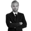 En profilbild av fastighetsmäklare Daniel Civill Heiskanen