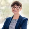 En profilbild av fastighetsmäklare Kerstin Bergström