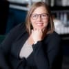 En profilbild av fastighetsmäklare Johanna Lundell