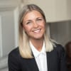 En profilbild av fastighetsmäklare Hanna Palmgren
