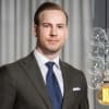 En profilbild av fastighetsmäklare Carl Horvath