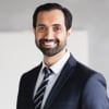 En profilbild av fastighetsmäklare Kenan Ibishi