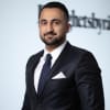 En profilbild av fastighetsmäklare Burak Yildiz