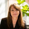En profilbild av fastighetsmäklare Anna Havborg