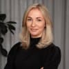 En profilbild av fastighetsmäklare Caroline Lundin