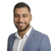 En profilbild av fastighetsmäklare Ahmed Waad