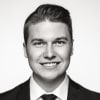 En profilbild av fastighetsmäklare Andreas Palmqvist