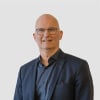 En profilbild av fastighetsmäklare Christer Bergh