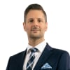 En profilbild av fastighetsmäklare Martin Hasselblad