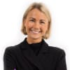 En profilbild av fastighetsmäklare Linn Asplund