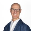 En profilbild av fastighetsmäklare Berndt Lindberg