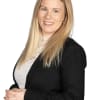 En profilbild av fastighetsmäklare Tina Högstedt