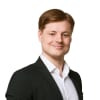 En profilbild av fastighetsmäklare Vilbur Stenlund