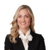 En profilbild av fastighetsmäklare Melinda Sjödahl