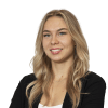 En profilbild av fastighetsmäklare Christine Vanberg