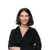 En profilbild av fastighetsmäklare Olivia Raaé