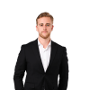 En profilbild av fastighetsmäklare Alexander Rudenok