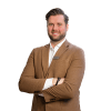 En profilbild av fastighetsmäklare Alexander Jodstam