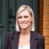 En profilbild av fastighetsmäklare Malin Carlqvist