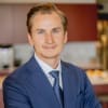 En profilbild av fastighetsmäklare Oscar Gyllby
