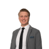 En profilbild av fastighetsmäklare Albin Haapakorpi
