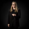 En profilbild av fastighetsmäklare Maria Kjellberg