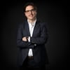 En profilbild av fastighetsmäklare Henrik Kjellberg