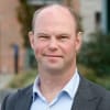En profilbild av fastighetsmäklare Mårten Kindlund