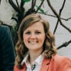 En profilbild av fastighetsmäklare Emma Nilsson