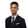 En profilbild av fastighetsmäklare Daniel Shemirani