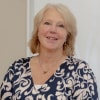 En profilbild av fastighetsmäklare Geraldine Andersson