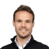En profilbild av fastighetsmäklare Joakim Carlström