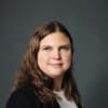 En profilbild av fastighetsmäklare Katarina Rosvall