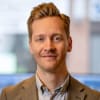 En profilbild av fastighetsmäklare Markus Malmqvist