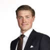 En profilbild av fastighetsmäklare Jacob Hempel