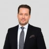 En profilbild av fastighetsmäklare Jonny Svantesson