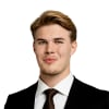 En profilbild av fastighetsmäklare Charlie Vesterberg