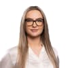 En profilbild av fastighetsmäklare Aneta Boniuszko