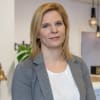 En profilbild av fastighetsmäklare Kerstin Romelin