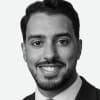 En profilbild av fastighetsmäklare Ayham Khaled