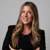 En profilbild av fastighetsmäklare Danielle Wallster