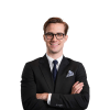 En profilbild av fastighetsmäklare Gustav Andersson