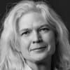 En profilbild av fastighetsmäklare Lena Bergman