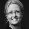 En profilbild av fastighetsmäklare Åsa Adeholm