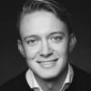 En profilbild av fastighetsmäklare Felix Mejman